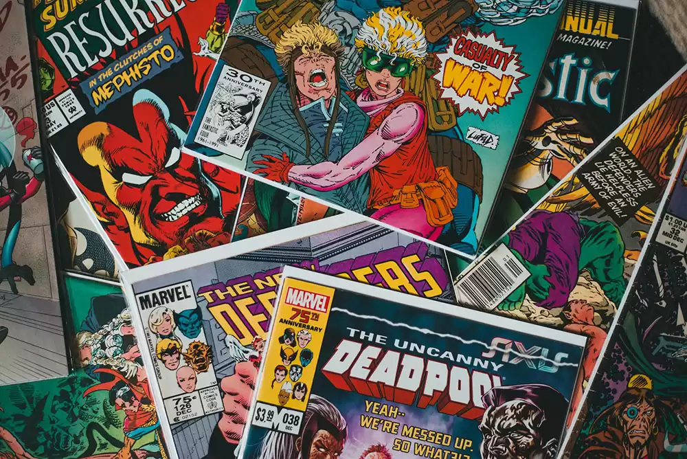 a pile of Marvel comic books